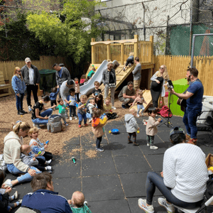 Families gather on playground for free family activities Corlears Learn Play Grow